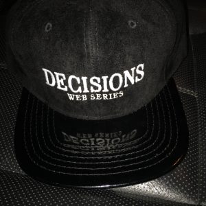 The Official Decisions Web Series Snapback. Features embroidered Decisions Web Series Logo on front. One size fits most. Snapback enclosure on back.